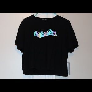 Black “Babygirl” crop graphic tee.